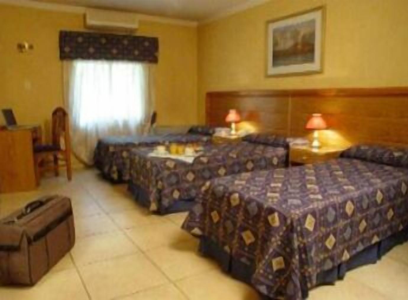 Hotel Provincial Mendoza Bagian luar foto
